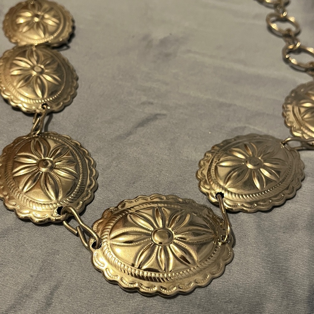 Silver-colored metal chain belt